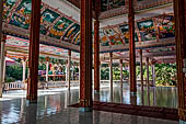 Vientiane, Laos - Pha That Luang, among the Other structures on the ground there is an open sala decorated with brightly colored paintings.  